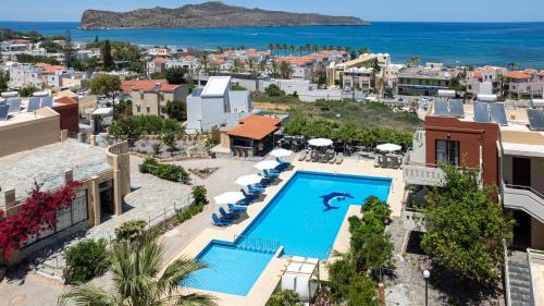 an aerial view of a resort with a swimming pool at Ekavi Apartments in Agia Marina Nea Kydonias