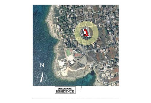 a map of an island with a red building at Complesso Gardencasa in Torre Suda