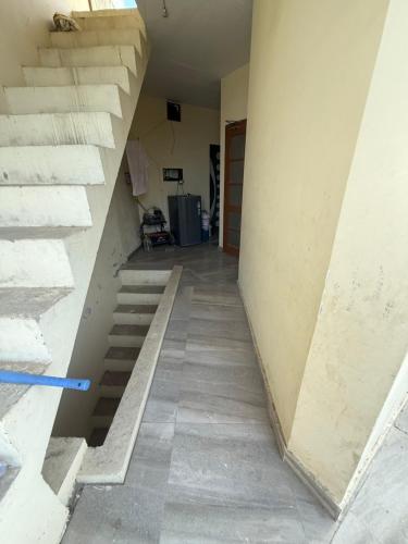 a stairway in a building with concrete steps at AC Room with attached bathroom and kitchen access in Zirakpur