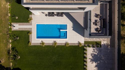 an overhead view of a swimming pool in a house at Villa Basini 5km from the centre of Split,Heated pool in Solin