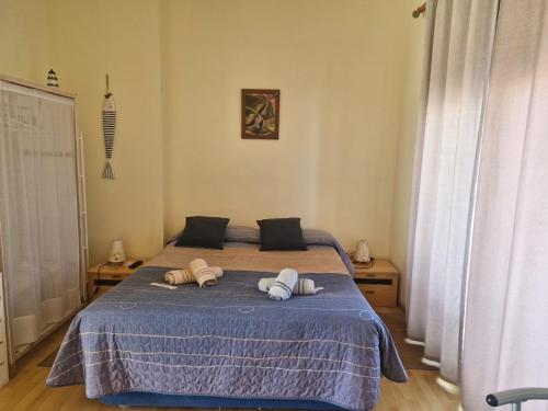 Llit o llits en una habitació de Triplex