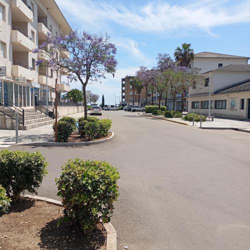 an empty street in a town with buildings at Casa Théodore in San-Nicolao