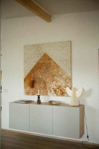 a painting of the pyramids is on a wall at Sigurstapi, Borgarfjörður Eystri in Borgarfjörður Eystri