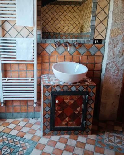 a bathroom with a sink and a mirror at Domus Liberty Luxury House in Sala Consilina