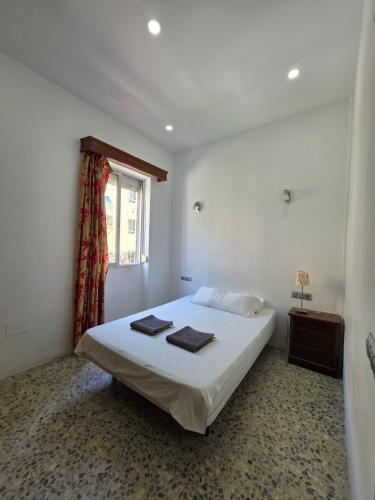 Preciosa Habitación privada comoda relajante ideal para pasar muy buenas vacaciones Wi-Fi centro malaga