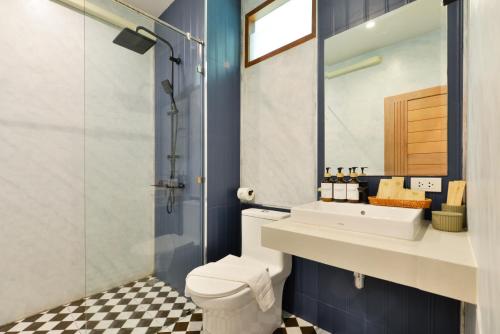 a bathroom with a toilet and a sink and a shower at Seacrest Boutique Kohtao Thailand in Ko Tao