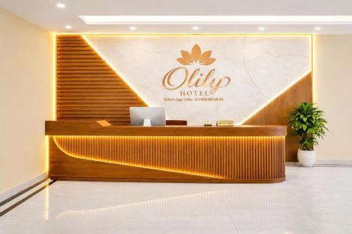 a lobby of a hotel with a reception desk at O Lily Hotel in Ninh Binh