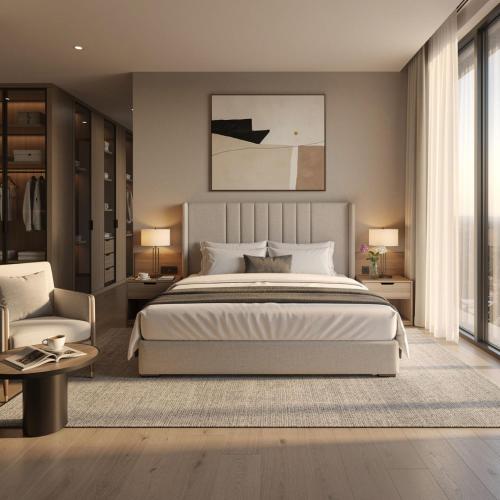 a bedroom with a large bed and a chair at Hotel The Luxury F S Bliss Most Premium Rooms NearTaj Mahal !!! Best Stay In Agra in Agra