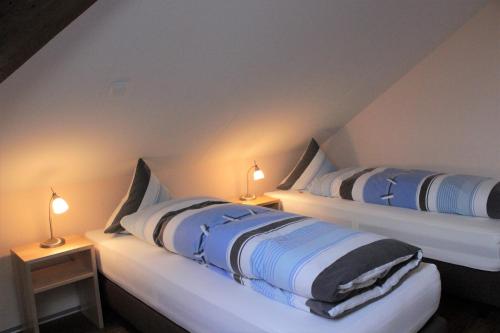 Кровать или кровати в номере Burgbühl