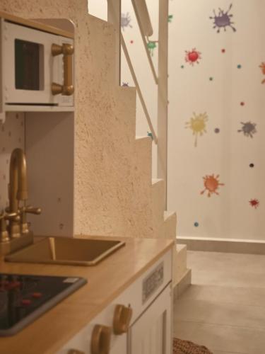 a kitchen with a sink and a counter top at RIZOMATA LUXURY VILLAS in Lefkada
