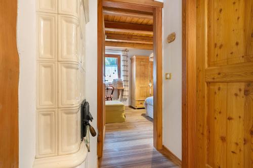 a door leading to a hallway with a room at Bnb Erba Maga in Rabbi