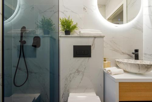 a bathroom with a shower and a sink at Villa Nika with pool & parking near Zadar in Bibinje