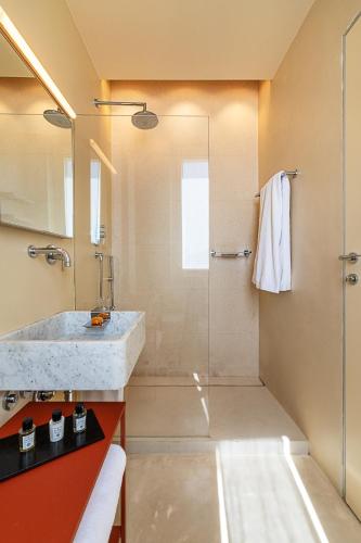 a bathroom with a sink and a shower at Villa Rosmarino in Camogli