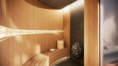 a small sauna with a wooden floor and a wooden at Twinpalms Treehouses Phuket in Bang Tao Beach