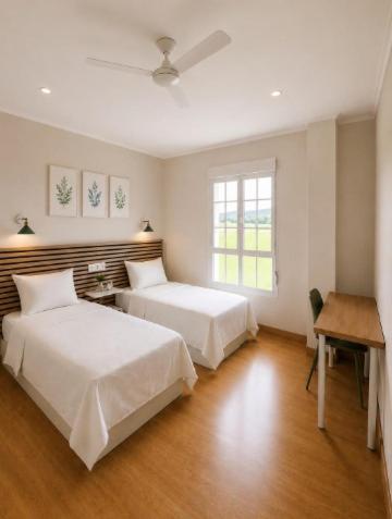a bedroom with two beds and a desk and a window at Hotel Peña Pintada by Vivere Stays in Lañada