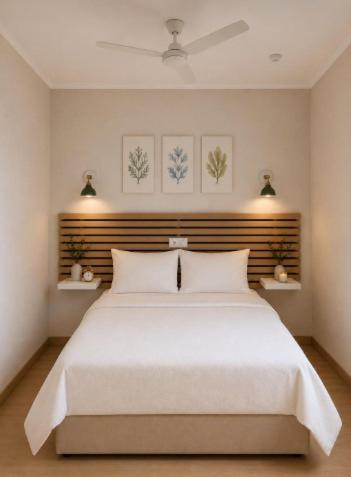 a bedroom with a large white bed with two pillows at Hotel Peña Pintada by Vivere Stays in Lañada