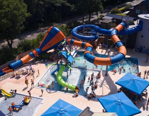 an aerial view of a water park with a water slide at Kampeerdorp de Zandstuve - Kindvriendelijke Vakantiepark in Rheeze