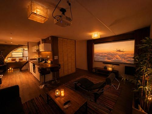 Loft hôtel, jacuzzi privatif, sauna et cinéma