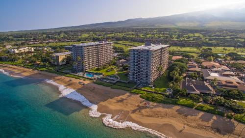 an aerial view of a beach and buildings at Aston at The Whaler on Kaanapali Beach in Lahaina