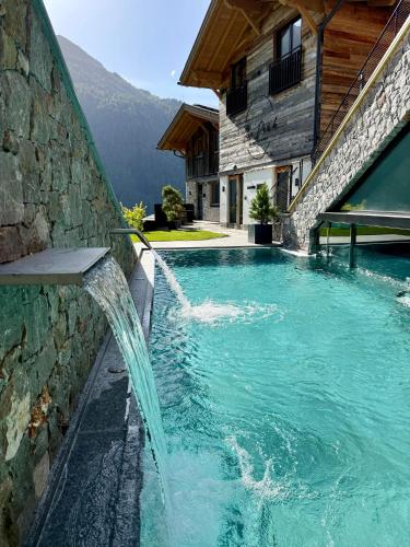 Foto Haus Melisande - Mountain Hideaway mit Pool 1