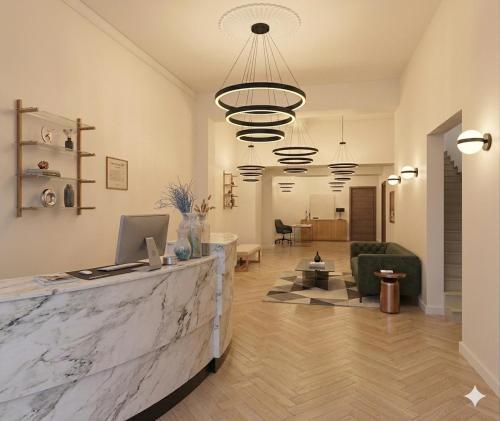 a lobby with a marble counter and a living room at Slimiza in Sliema