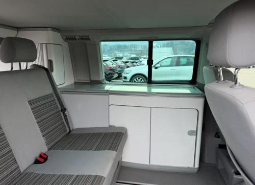 an interior view of the inside of an rv with a window at Nomad Campers VW California in La Mareta