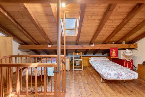 a room with two bunk beds and a staircase at Colico Lake e Relax in Colico