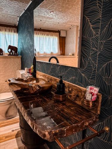 a bathroom with a sink and a mirror at Smith's house in Borgo San Dalmazzo