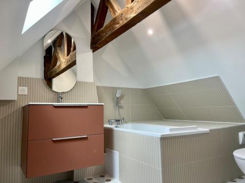 a bathroom with a sink and a toilet at l'Ocean in Dieppe