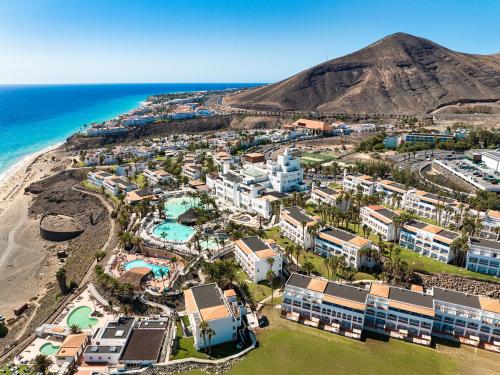 an aerial view of a resort next to the beach at Club Jandía Princess in Playa Jandia
