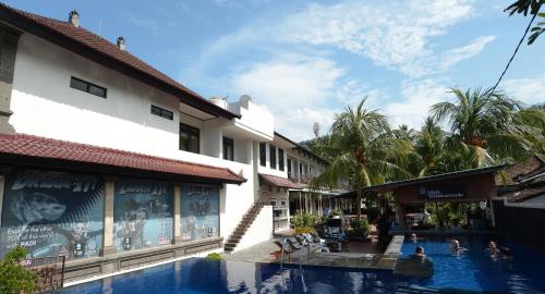 The swimming pool at or close to Absolute Scuba Bali Dive Resort