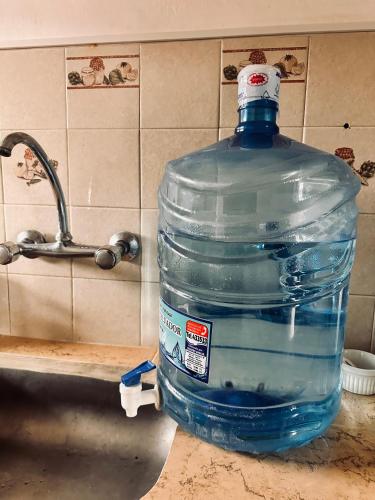 a large bottle of water sitting on top of a counter at El Descanso APART in Libertador General San Martín