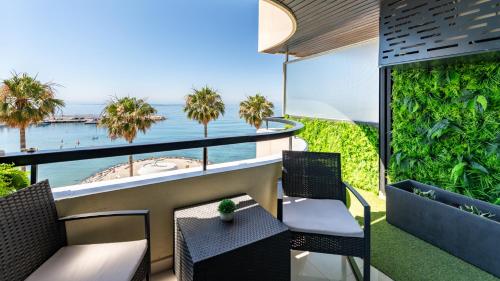 a balcony with a view of the ocean at Marbella Beachfront Studio with Stunning Sea Views in Marbella