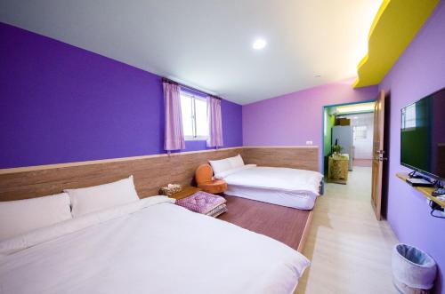Postel nebo postele na pokoji v ubytování Baisha 31 B&B