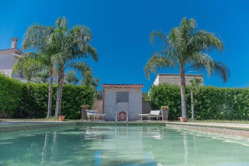 Villa IslaMaris con Piscina nel Boomerang Village a Torre Colimena