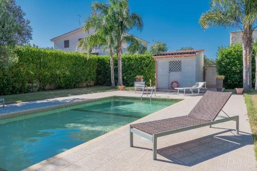 Villa IslaMaris con Piscina nel Boomerang Village a Torre Colimena