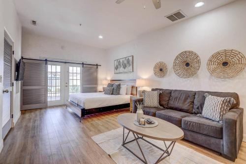 a living room with a couch and a bed at Relaxing Quiet Resort - Dog Friendly in St. George