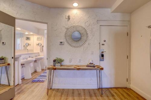 a bathroom with a sink and a mirror on the wall at Relaxing Quiet Resort - Dog Friendly in St. George
