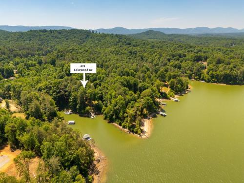 an aerial view of a lake with a sign that reads independence at Bella Di Lago in Wilkesboro