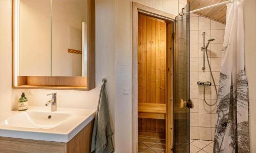 a bathroom with a sink and a shower at VE087-Vejers-Strand-Jafdalvej-41 in Vejers Strand