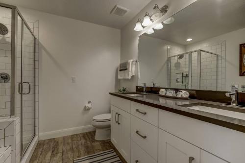 a bathroom with a sink and a toilet and a shower at Long Stays Welcome! Pet Friendly & Heated Pool in Washington