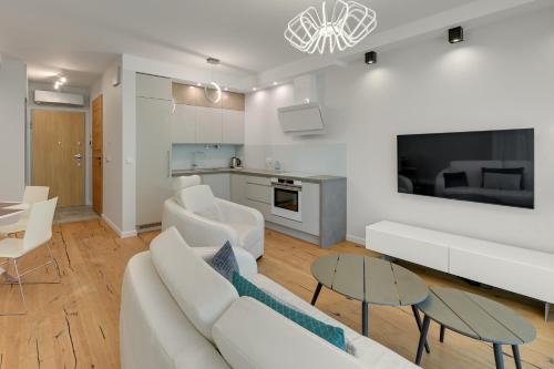 Tre Mare z ogrodem 2 by Grand Apartments