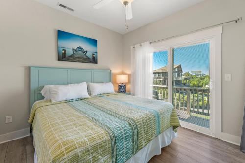 a bedroom with a bed and a large window at Little Cayman in Salvo