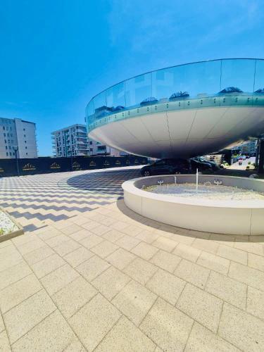 a building with a glass dome on top of it at NATALIA - Building Stefan Resort II in Năvodari