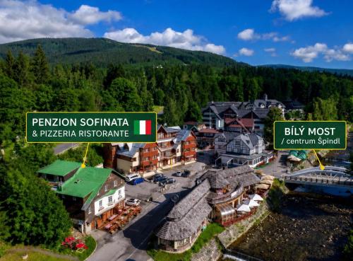 an aerial view of a small town in the mountains at Penzion Sofinata & Pizzeria Špindlerův Mlýn in Špindlerův Mlýn