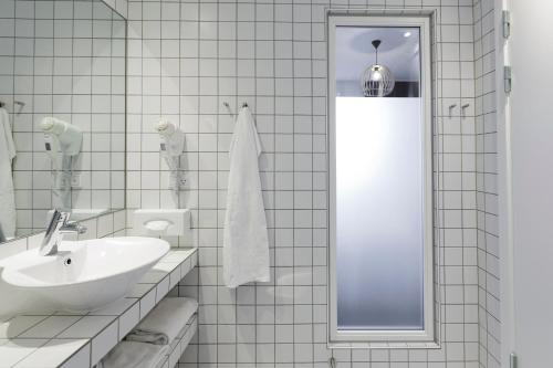 Koupelna v ubytování Hotel Strandparken