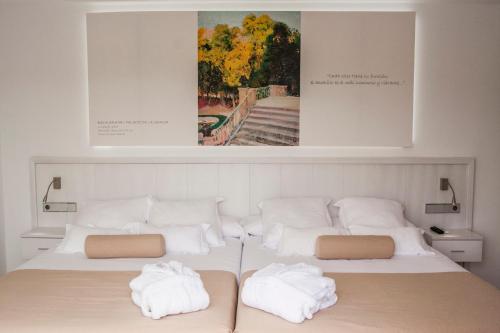Postel nebo postele na pokoji v ubytování Villa Luz Design & Art Hotel