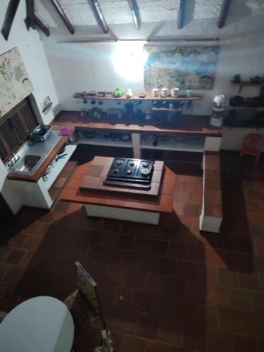 a model of a kitchen with a stove top oven at Casa Campo Majo in Chinauta