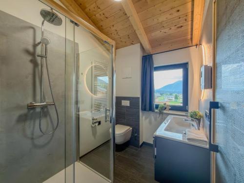 a bathroom with a shower and a sink at Obermöschach 1B in Lake Pressegg