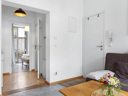a living room with a couch and a table at Lee in Wismar